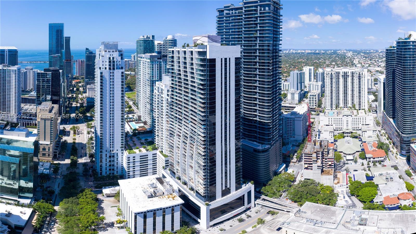 Welcome Home! Highly sought after 05 Line 3 Bed / 3 Bath + Den Unit in 1010 Brickell, completely gutted and upgraded. Unit features private elevator, bay views, custom doors & wall coverings, floor-to-ceiling impact windows, built-out closets, drop-down ceilings with custom lighting, new vanities & bathrooms, modern kitchen, etc. 1010 Brickell is a new condo in the heart of Brickell, steps away from all the action. Building features include indoor basketball, rooftop pool, kids' playground, gym, racquetball, golf simulator, spa, bowling, jacuzzi, valet, etc. This unit will not last, so call today to schedule your tour!
