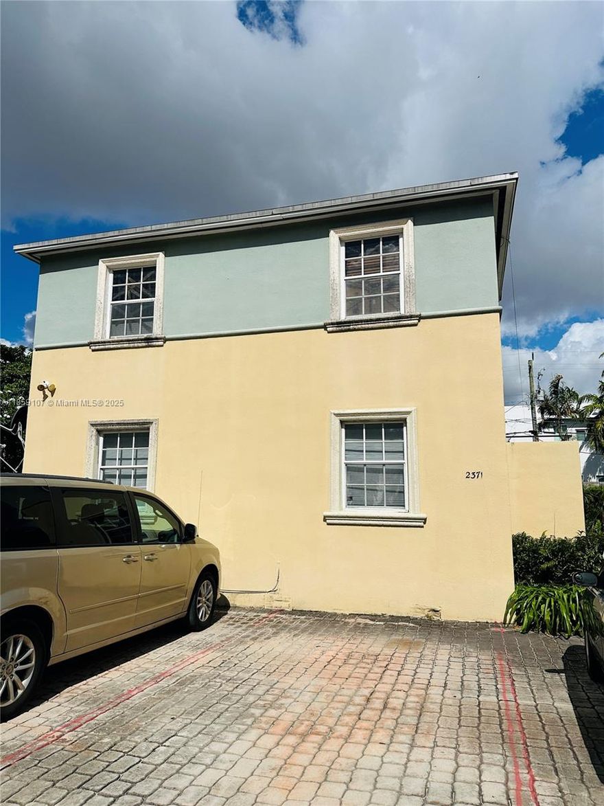 Prime Location in Miami! Investment Opportunity! 2371 SW 27th St is a well-maintained fourplex offering four spacious 2-bed/1-bath apartments with central A/C and a functional layout that appeals to both long-term and short-term tenants. Located just minutes from The Underline Park, Coconut Grove, and Coral Gables, with quick access to US-1, the Metrorail, Brickell, and Downtown Miami, this property offers unmatched convenience. UM students can be on campus in less than 7 minutes via Metro. Features include ample on-site parking, strong year-round rental demand, and significant potential to increase rents and boost the cap rate with strategic upgrades—making it an ideal choice for investors seeking both steady cash flow and growth. Unbeatable location, seller financing available!