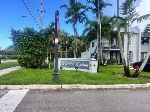Photo of 16531 Blatt Blvd #103, Weston, FL 33326 (MLS # A11881977)