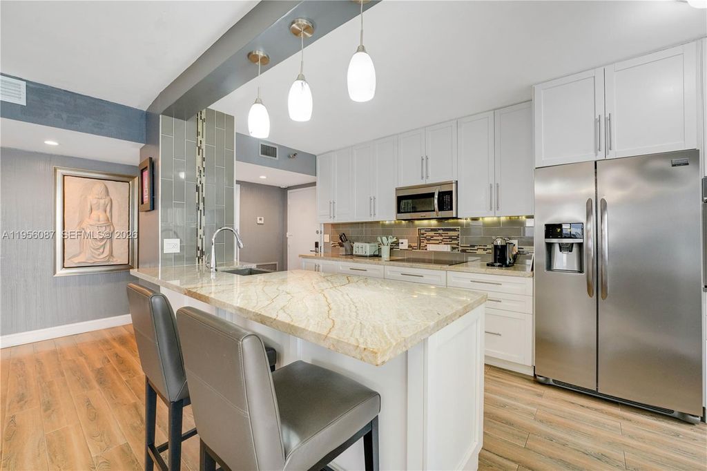 Photo of 3850 Washington St #702, Hollywood, FL 33021 (MLS # A11956087)