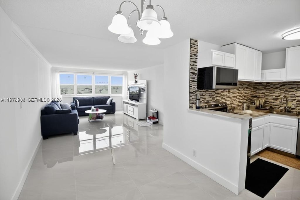 Photo of 111 Golden Isles Dr #C9, Hallandale Beach, FL 33009 (MLS # A11978964)