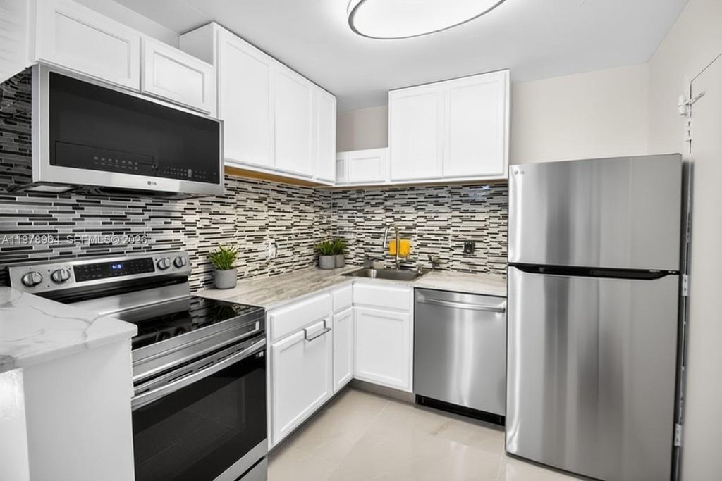 Photo of 111 Golden Isles Dr #C9, Hallandale Beach, FL 33009 (MLS # A11978964)