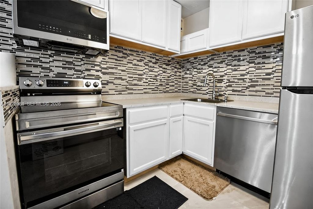 Photo of 111 Golden Isles Dr #C9, Hallandale Beach, FL 33009 (MLS # A11978964)