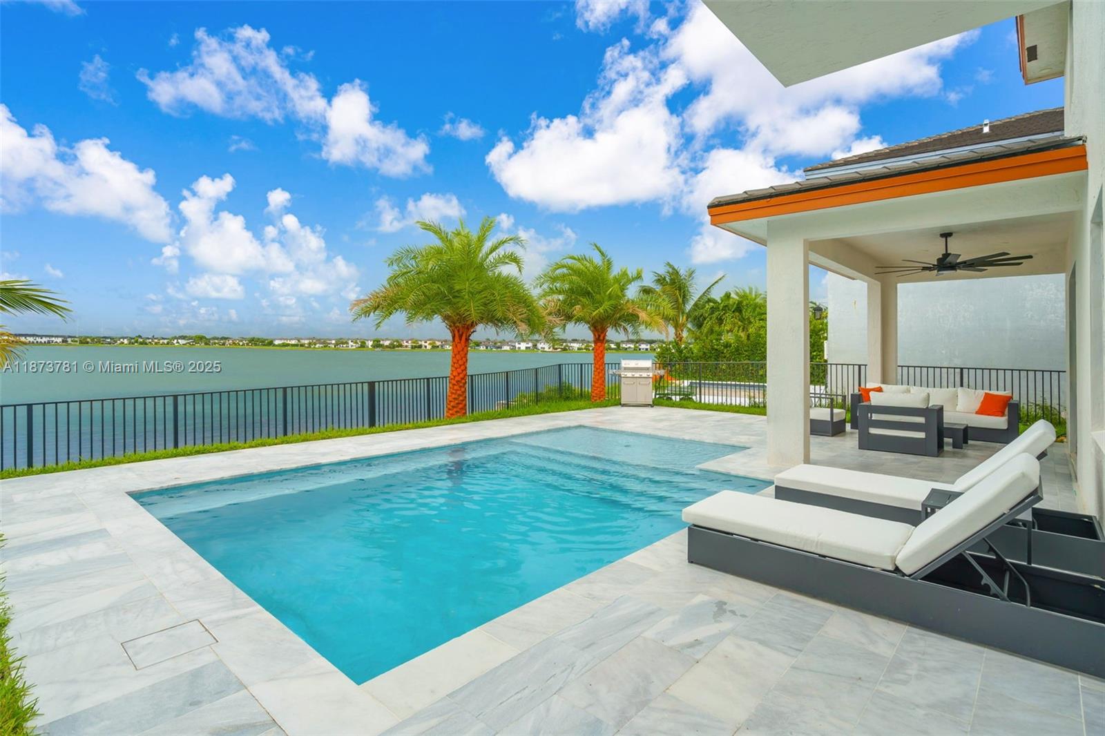 Impeccable, move-in ready home with a sleek modern design, abundant natural light, and soaring ceilings that enhance both elegance and comfort. Design your lifestyle in this Oasis-model residence, nestled within a prestigious gated community. Enjoy breathtaking lake views from the beautifully tiled patio and the brand new saltwater heated pool perfect for year round relaxation and entertaining. The floor plan also features a convenient ground-floor bedroom with a full bathroom, ideal for guests or multi-generational living. Community amenities complete the lifestyle, offering a stunning lakefront clubhouse, resort-style pool, dock, scenic walking paths, pagodas, gardens, parks, and more.