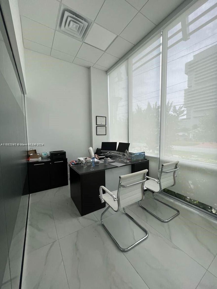 Office Space for Rent! This modern 430 sq ft corner unit at Beacon Hallandale is move-in ready. Located on the first floor of a 2019 building, it includes one assigned parking space at no extra cost. Enjoy amenities like a reception area, conference rooms, and a cafeteria. Perfectly situated across from Gulfstream Mall and close to Aventura Hospital, Target, and Whole Foods, this area is undergoing significant redevelopment. Act now—contact the listing agent for an easy showing! Don’t miss this chance to rent in a thriving location!