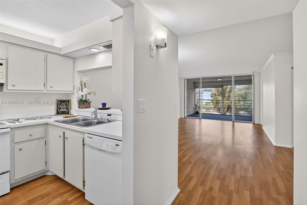 Photo of 1831 Sabal Palm Dr #306, Davie, FL 33324 (MLS # A11986535)