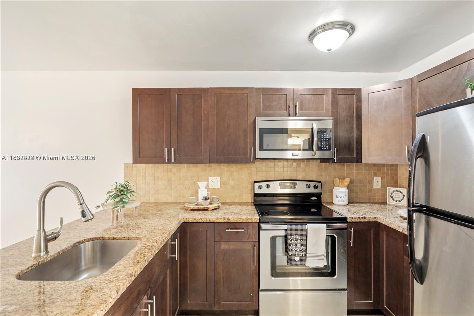 Enjoy Miami Lakes living in this updated 1-bedroom, 1-bath condo. The spacious master bedroom features a large closet and private patio access. The kitchen offers stainless steel appliances and granite countertops. This first-floor unit includes hurricane shutters and is conveniently located near restaurants, shops, a movie theater, and an athletic club.
Rent includes water and garbage service.
First month's rent and security deposit required.
Move-in ready!