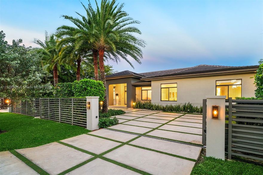 Completely Gated and private turn-key transitional modern one story home in desirable North Pinecrest. Great floorplan with soaring 12-foot ceilings. Oversized living areas, and tons of natural light. Featuring: Gourmet Kitchen with designer appliances open to spacious family room. 6 bedrooms with en suite bathrooms. Amazing oversized covered terrace with outdoor kitchen, perfect for entertaining, Large circular driveway, 3 car garage, ample yard showcasing a modern pool with a tanning ledge. Excellent location, close to major highways, great schools,  South Miami, Dadeland Mall, Restaurants & easy access to Downtown Miami.