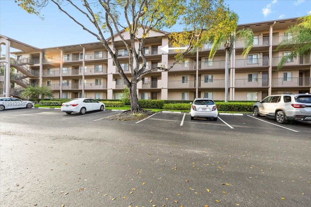 Photo of 12551 SW 16th Ct #404C, Pembroke Pines, FL 33027 (MLS # A12012240)