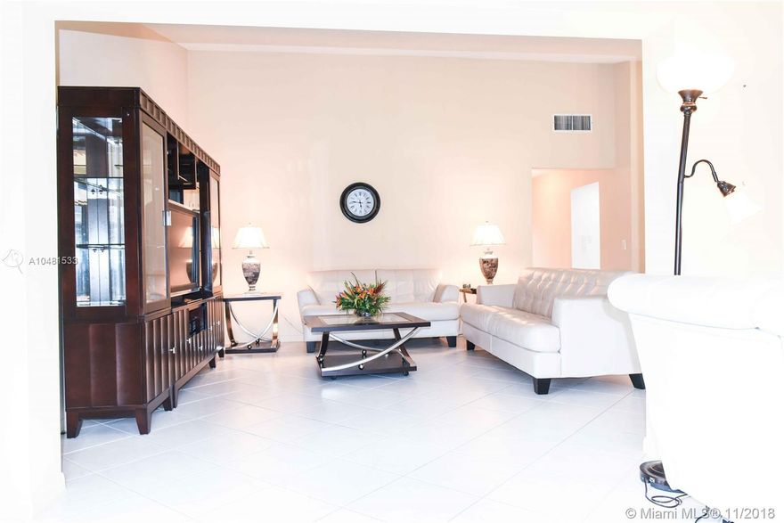 Live the life you have been waiting for in this ready to move in single family home with a garage. Updated eat-in kitchen with high gloss white cabinets, quartz countertop and backsplash, under cabinet sliding drawers, recessed lighting. Pass thru window to open concept great room with vaulted ceilings. Master bedroom has a walk-in closet with floor to ceiling organization and updated bathroom. Split floorplan. 2nd bedroom's closet has wall-to-wall built-in organization. Lots of storage space. Impact windows (no need to board for the storms or the Summer). New A/C installed 2016. Water heater and roof newer. Active 55+ community features clubhouse for shows, billiards, tennis, shuffleboard, pool, gym and more for a low HOA. Close to it all... Shopping, golf, casinos, beaches and highways.