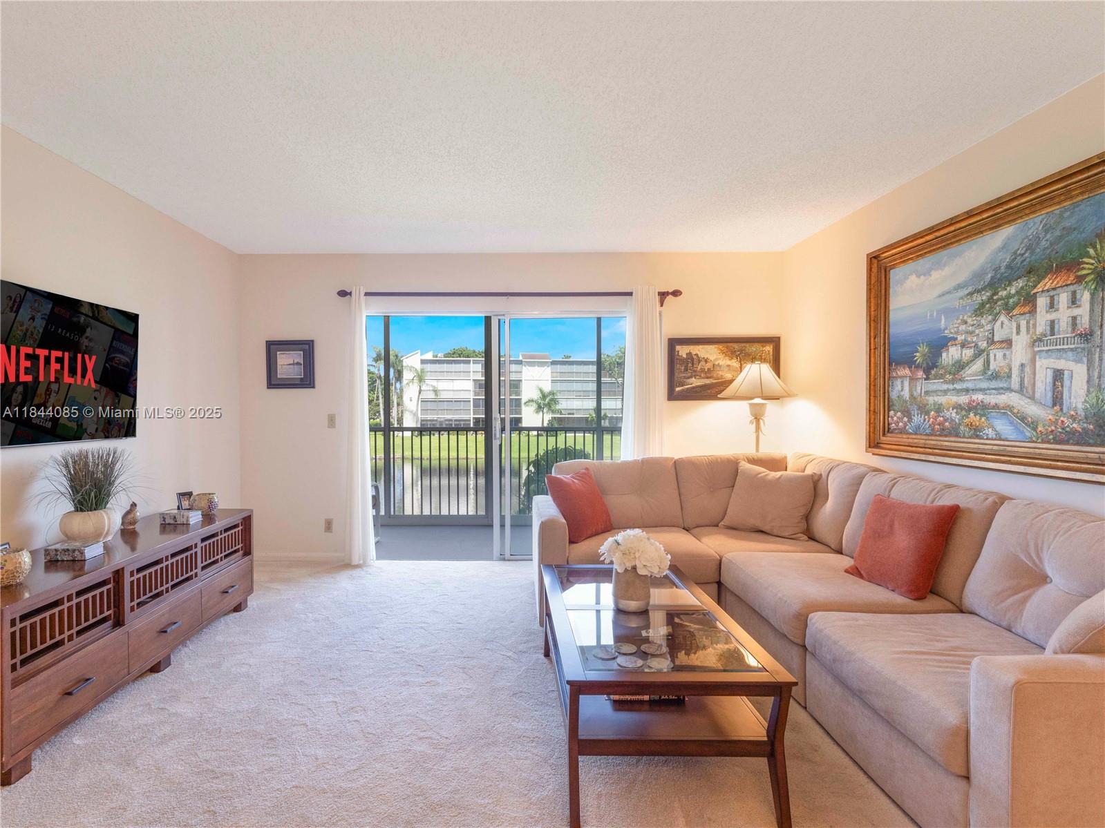 Beautiful 2BR/2BA furnished (negotiable) condo in gated 55+ Huntington Lakes. Enjoy serene lake views from your screened-in patio with sliding glass doors. Located on the 2nd floor with elevator access, this 1,070 sq. ft. unit features a split floor plan, in-unit laundry, pantry, carpet/tile flooring, and outdoor storage. Includes a 1-year American Home Shield home warranty for peace of mind. Huntington Lakes offers a renovated clubhouse, resort-style pool, sauna, fitness center, tennis, pickleball, theater, and full social calendar. Minutes to shops, dining, medical, and beaches. Move-in ready—bring your toothbrush and start enjoying the Florida lifestyle!