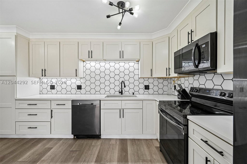 Photo of 5016 50th Way, West Palm Beach, FL 33409 (MLS # A12044292)