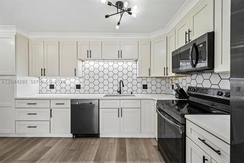 Photo of 5016 50th Way, West Palm Beach, FL 33409 (MLS # A12044292)