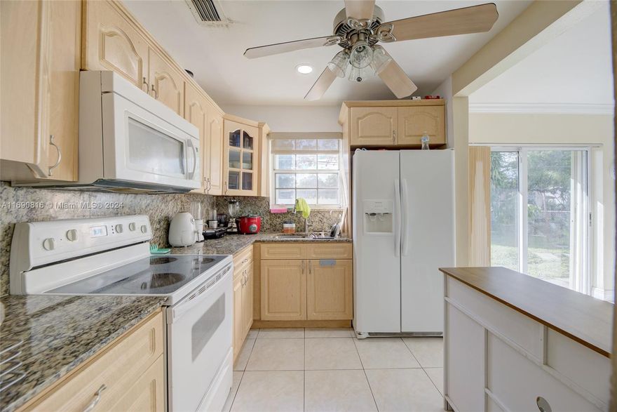 Welcome to this beautifully updated 3-bedroom, 2-bath home in the desirable Boulevard Heights neighborhood of Hollywood, FL! This charming home offers a spacious 7,000 sq. ft. fenced backyard, perfect for outdoor activities, gatherings, or simply enjoying the Florida sunshine in privacy. Inside, you'll find durable and easy-to-maintain ceramic flooring throughout. Also updated kitchen boasts elegant granite countertops, providing both style and functionality.
Additional highlights include accordion hurricane shutters for peace of mind, a convenient one-car carport, and a modern energy-saving solar panel system to reduce utility costs. This home combines comfort, style, and efficiency.
Seller offer a credit up to $10,000.00 to buyer at closing towards payment of solar panels.