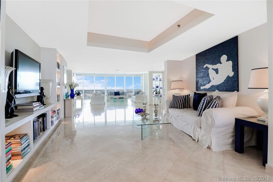 Spectacular flow-through unit at the ultra-chic Murano Grande with breathtaking, unobstructed views of Miami Beach, Fisher Island and the Miami skyline. Residence 2904 consist of 3 BED/3.5 BATHS and offers floor to ceiling windows, 2 large terraces (sunrise/sunset) gorgeous custom finishes including LED lighting system and electronic window treatments, marble and wood flooring, state-of-the-art-kitchen with Miele/Subzero appliances and a private elevator vestibule. Murano Grande is one of SOFI’s most exclusive full-service waterfront buildings directly on Biscayne Bay with Five Star resort-like amenities such as a bayside pool, onsite restaurant, gym, spa and tennis court. Adjacent to the Miami Beach Marina, dock your boat and a day at sea is just minutes away.