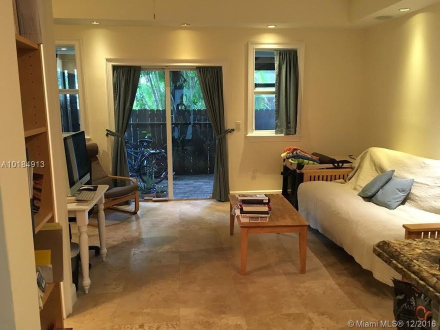 This amazing tri-level town-home is close to Coco Walk, Flanigan's and Berrys. Has a private rooftop terrace, private small yard and 2 parking spaces. The unit has marble floors, granite counters, stainless steal appliances, high end washer & dryer. Nice shower and bathrooms. Gated community with only 4 units, pet friendly and no pet restrictions.