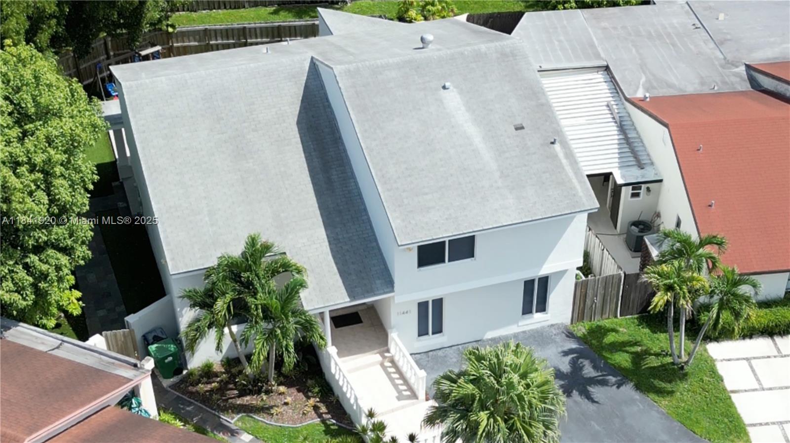 Located in a cul-de-sac, as you enter this beautifully remodeled detached single family home you'll notice how bright and full of light it is, thanks to the many impact windows and high ceilings it has. Walk into a living-dining leading to the large kitchen where you can look out to the backyard. Continue onto a very large dining-family room that leads to french doors going onto a covered terrace, perfect for entertaining. Before stepping outside you'll also see a bedroom and full-bath, perfect for in-laws. Once on the 2nd floor you'll find extra privacy for the other 3 bedrooms and 2 baths, of which the principal bedroom has space for a seating area, large walk-in closet and dual vanities. Large fenced yard for big parties!