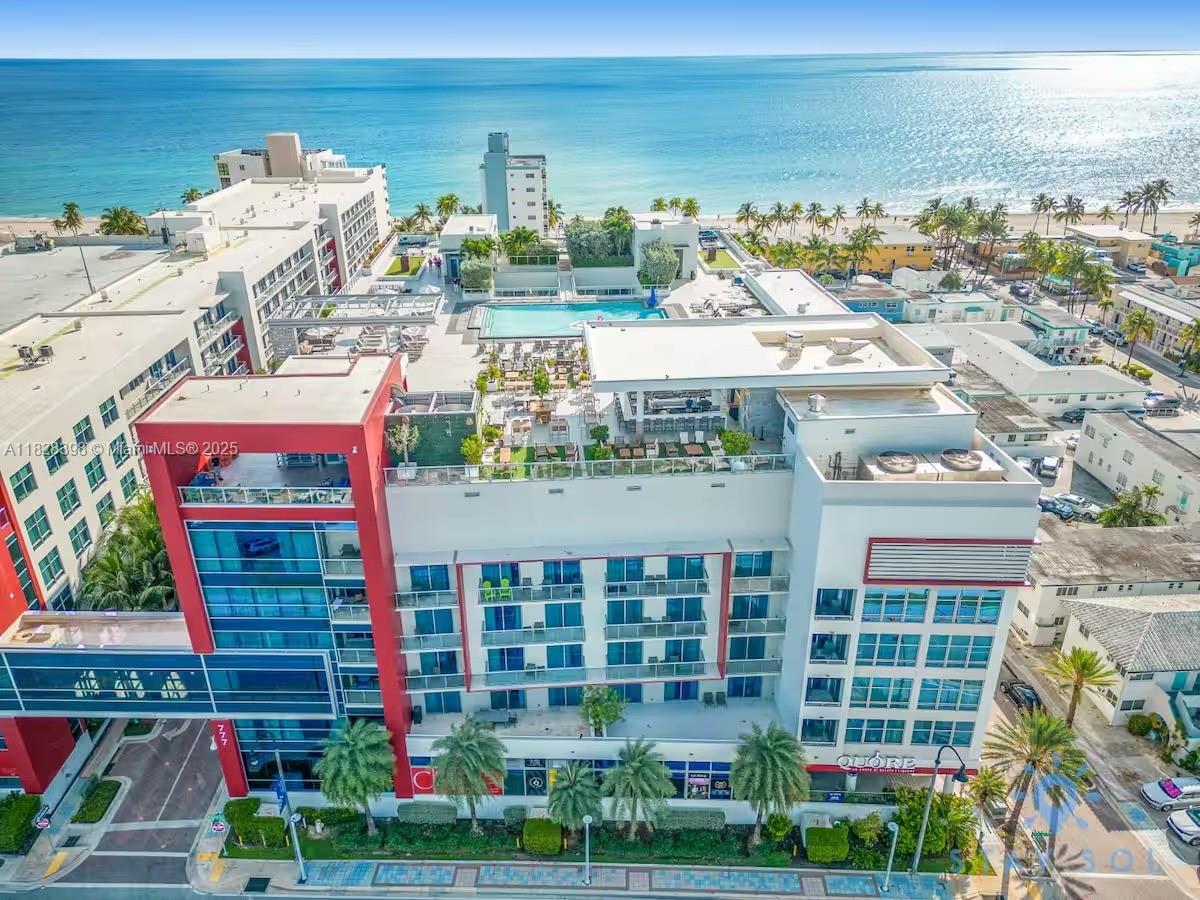 MODERN 1BD/1BA UNIT IN THE MAIN BUILDING OF COSTA HOLLYWOOD RESORT—JUST STEPS FROM THE FAMOUS HOLLYWOOD BROADWALK. LOCATED ON THE 4TH FLOOR OF A 5-STORY STRUCTURE, THIS FULLY FURNISHED CONDO FEATURES A EUROPEAN-STYLE KITCHEN WITH QUARTZ COUNTERTOPS, PARTIAL OCEAN VIEWS, AND HOTEL-STYLE LIVING WITH NO RENTAL RESTRICTIONS. DAILY, WEEKLY, MONTHLY OR YEARLY RENTALS PERMITTED. AIRBNB-FRIENDLY AND CURRENTLY PRODUCING INCOME WITH A 4.7-STAR GOOGLE RATING. DIRECT ACCESS TO ROOFTOP RESTAURANT, INFINITY POOL, FITNESS CENTER, AND COMPLIMENTARY VALET PARKING. HOA COVERS MOST UTILITIES. PET-FRIENDLY AND MOVE-IN READY. PRIME LOCATION—IDEAL FOR PERSONAL USE OR AS A TURNKEY INVESTMENT.