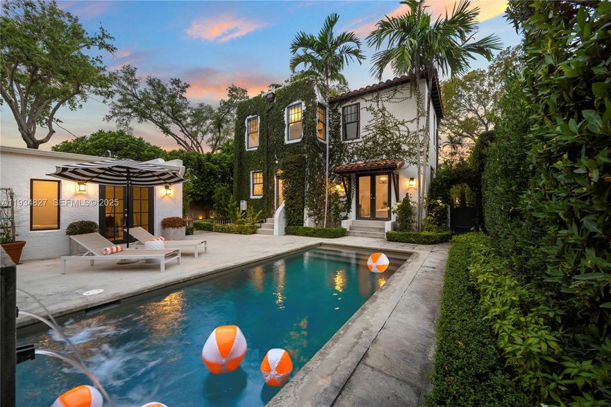 Located on one of the best streets in guard-gated Upper Morningside, this gorgeous 4BD/3.5BA, 3,209SF (total) ivy-adorned residence has been flawlessly renovated with exceptional charm & the highest quality fixtures & finishes. No detail was overlooked in this magnificent home, boasting separate family rooms, bar area, fireplace, Waterworks fixtures throughout, formal dining, upstairs laundry room, full impact glass & new roof. The chef’s gas kitchen features an eat-in island, custom storage & a professional appliance suite. The primary suite includes a stunning bedroom, a dressing area lined with custom-built closets & luxurious en-suite bath. Enjoy a fabulous outdoor patio complete with a pool, water features & a detached 1BD/1BA cabana with a 1-car garage + carport. NOT IN FLOOD ZONE!