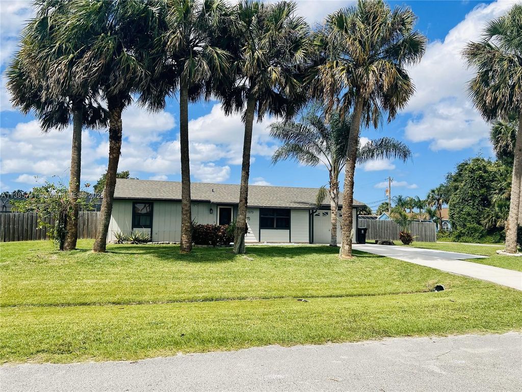 Photo of 1573 SW Lexington Dr, Port Saint Lucie, FL 34953 (MLS # A11385741)