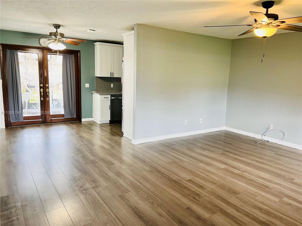 Photo of 1573 SW Lexington Dr, Port Saint Lucie, FL 34953 (MLS # A11385741)