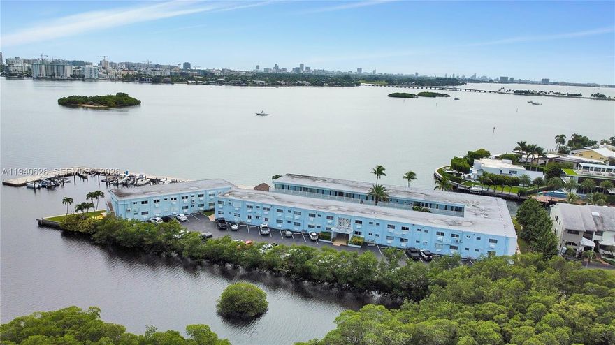 Experience refined waterfront living in a true resort-style setting with breathtaking, wide-open views of Biscayne Bay. Enjoy effortless boating with no fixed bridges and quick access to Haulover Cut, or embrace nature by kayaking directly into the pristine Oleta River. Spend your days fishing from the private pier or unwinding by the waterfront pool while soaking in spectacular bayfront scenery.

This exceptional and rare offering features a residence with a private dock, within the exclusive gated Fairmont House community. The unit boasts creating an expansive indoor-outdoor living experience ideal for entertaining or relaxing while enjoying the bay breeze.

Residents enjoy a serene, low-density waterfront lifestyle with lush landscaping, secure entry, and a peaceful ambiance rarely found in South Florida. Ideally located just minutes from beaches, dining, shopping, and major roadways, this home offers the perfect balance of privacy and convenience. Easy to show—call for instructions. Cash or special financing for co-op purchases only. No rentals permitted for the first 2 years.