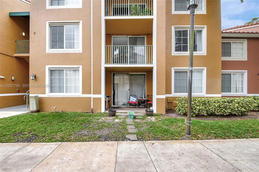 Photo of 7808 Sonoma Springs Cir #204, Lake Worth, FL 33463 (MLS # A12007790)