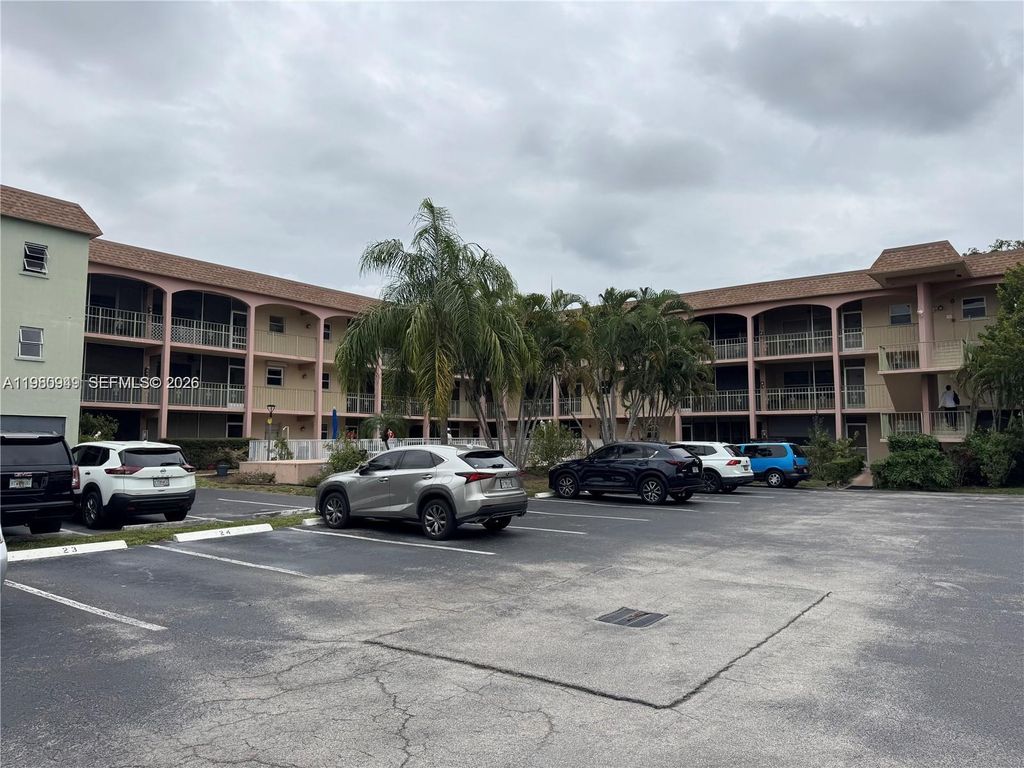 Photo of 100 SE 6th Ave #207, Pompano Beach, FL 33060 (MLS # A11980949)