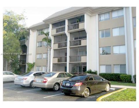 Photo of 711 N Pine Island Rd #316, Plantation, FL 33324 (MLS # A11809501)