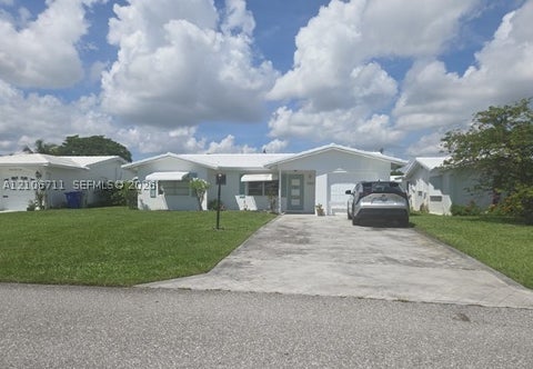 Photo of 2521 E Golf Blvd, Pompano Beach, FL 33064 (MLS # A12106711)