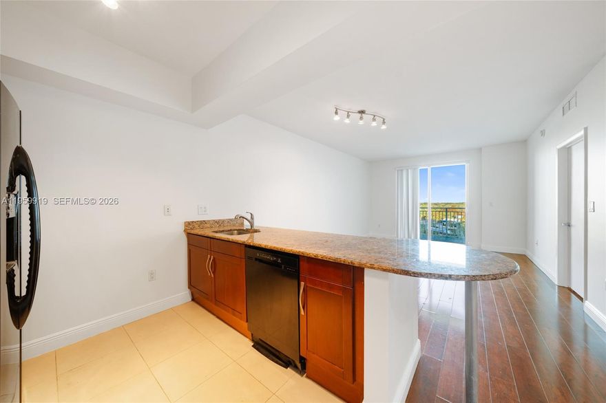 Bright and well-appointed 1-bedroom, 1-bath residence in the desirable Downtown Dadeland community. This unit offers a functional 749 SF layout with tile flooring throughout, an open kitchen, and a spacious living area with natural light. Enjoy the convenience of an assigned parking space in a secure garage and access to full-service building amenities, including a pool, fitness center, concierge, and on-site management. Ideally located steps from shops, restaurants, MetroRail, and everyday conveniences, with easy access to major roads, Coral Gables, and Downtown Miami. A great opportunity to enjoy urban living in one of South Miami-Dade’s most vibrant communities.