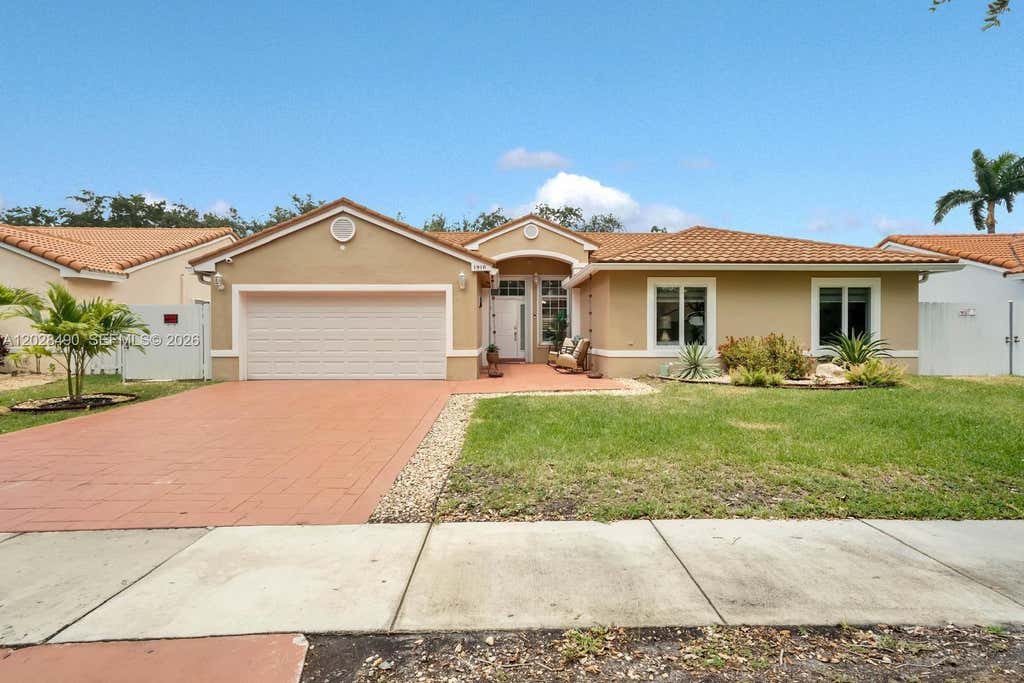 Photo of 1910 SW 135th Way, Miramar, FL 33027 (MLS # A12028490)