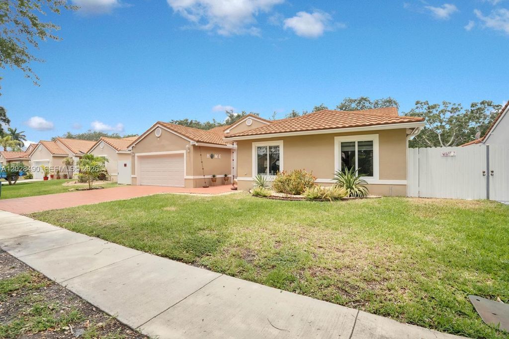 Photo of 1910 SW 135th Way, Miramar, FL 33027 (MLS # A12028490)