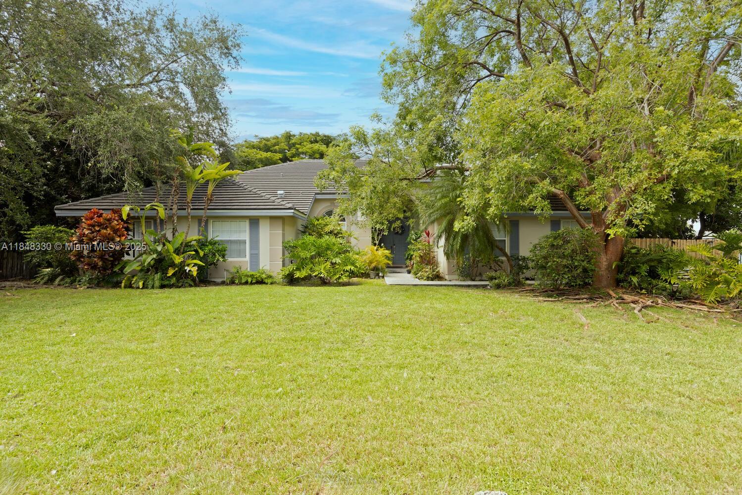 When opportunity knocks...you have to listen! Located in Old Cutler Glen... Spacious 5 bedroom/3 bath home loaded with potential. Private location. Split bedroom floorplan allows a spacious primary bedroom with either a den/home office or 5th bedroom on one side of the home with the remaining 3 bedrooms on the other side. Double door foyer entry to living room with separate dining and bar area. Kitchen sits off breakfast area overlooking family room. All sliding glass doors open out to patio area. Fantastic cul de sac lot with 26,273 sq.ft. loaded with fruit trees. This home is ready to be customized and made into your dream home. New roof in 2022,flood, zone X means no flood insurance. Questions? Contact listing agent.