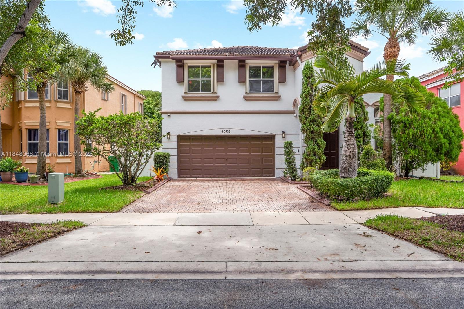 Beautiful 4BR/3BA home in the gated, resort-style community of Riviera Isles. Ideal for families, this home features 1BR on the 1st floor—perfect for guests or in-laws. Remodeled kitchen and master bath, custom closets, bamboo wood flooring, and a newer A/C unit. Spacious foyer leads to a large living room. Two-car garage with ceiling-mounted storage system. Enjoy outdoor living with travertine pavers and a sleek aircraft steel pergola. Wired security cameras included. Community offers 24/7 security, clubhouse, pool, gym, and pickleball courts. Zoned for top-rated schools: Dolphin Bay Elementary, Glades Middle, and Everglades High. Move-in ready and family-friendly!For showing instructions, please see broker remarks.