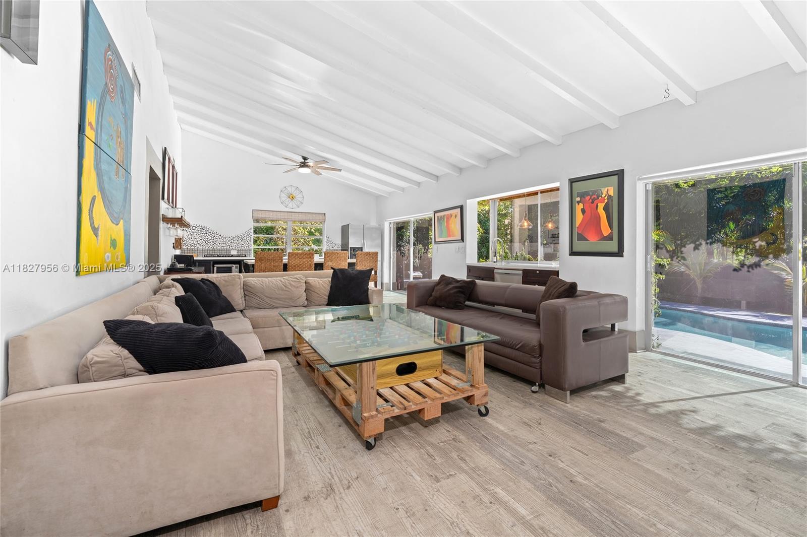 Tucked away on a sprawling half-acre lot, this one-of-a-kind residence blends bold artistic design with modern functionality. Recently transformed through a meticulous renovation, every inch of this home radiates creativity and charm. Soaring 14-foot vaulted ceilings make a dramatic impression, while the private underground pool sets the stage for unforgettable entertaining. Boasting 5 spacious rooms and 4 designer bathrooms, this home offers unmatched flexibility—perfect for multigenerational living, private guest quarters, or income-producing opportunities via Airbnb or VRBO. Airbnb is fully permitted—reports available upon request. Whether you're seeking a unique personal residence or a high-performing investment, the possibilities here are endless. Call to schedule a private tour today