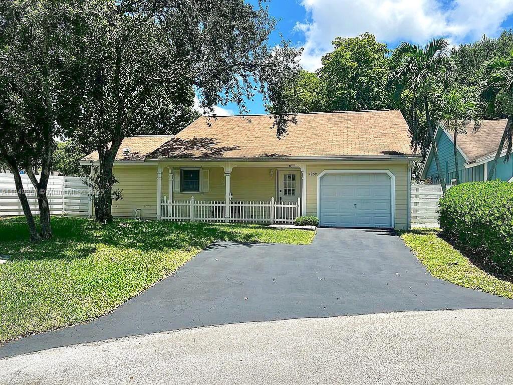 Welcome to the prestigious Country Walk Community and this move-in-ready well maintained 2 bedroom 2 bath home nestled in a quiet cul-de-sac. The home features a master bedroom with a large walk in closet and ensuite bathroom that has been upgraded with an easy step sunken shower. Additional the second full bathroom has also been upgraded. The home offers a one car garage with laundry area. The home is equipped with hurricane accordion shutters. The backyard offers a nice quiet retreat with a large delicious mango tree. Country Walk has 24/7 security, 2 pools with a very short walk club house with basketball ball, pickle ball, swimming pool, beautiful lake and walking area.