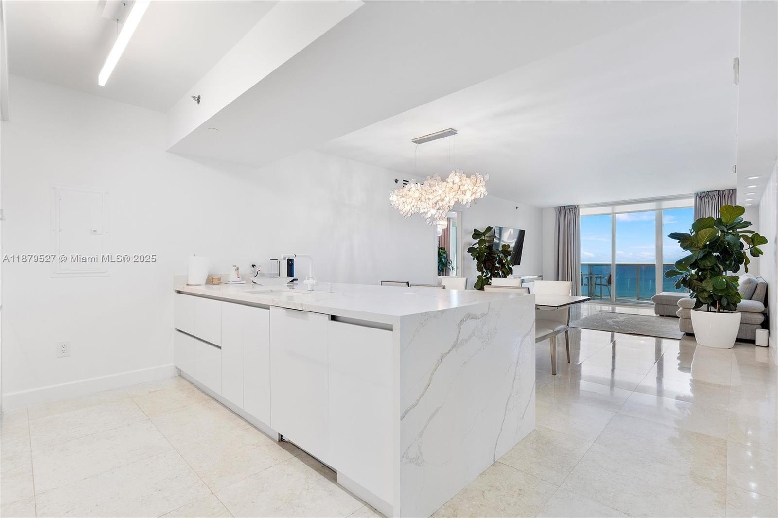 This beautifully remodeled and fully furnished 2-bedroom plus enclosed den, 3-bath home offers breathtaking panoramic views of the Atlantic Ocean and Intracoastal Waterway. Designed with comfort and style in mind, the residence features versatile sleeping arrangements and modern finishes throughout. Enjoy a world-class lifestyle with access to five heated pools, a 50,000 sq. ft. spa and fitness center overlooking the ocean, 24-hour valet, concierge services, and full-time security.Prime location near Gulfstream Park, Bal Harbour, Hollywood Boardwalk, South Beach & Las Olas. Price may be changed depending on season