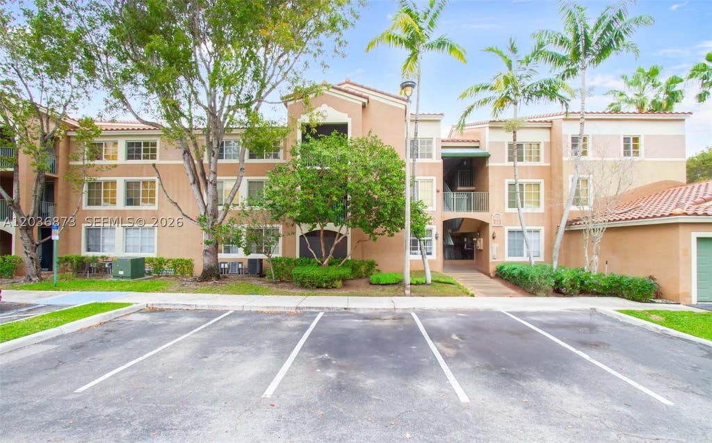 Photo of 4824 N State Road 7 #9105, Coconut Creek, FL 33073 (MLS # A12036873)