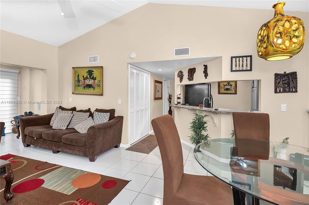 Photo of 7 Via De Casas Sur #103, Boynton Beach, FL 33426 (MLS # A11608040)