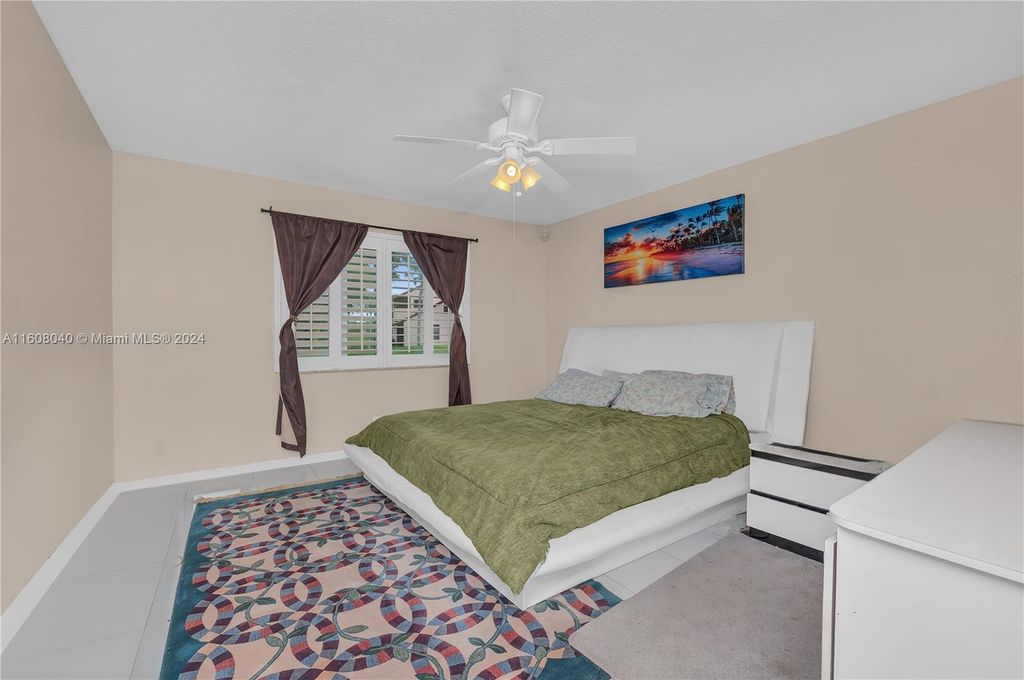 Photo of 7 Via De Casas Sur #103, Boynton Beach, FL 33426 (MLS # A11608040)