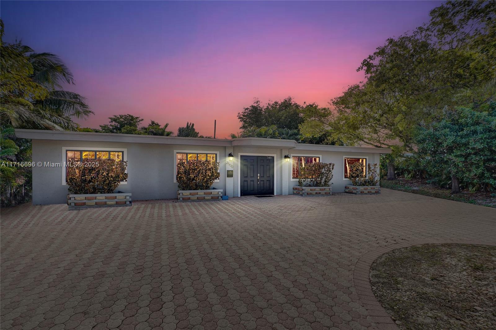 Motivated Seller! Over $75K in renovations. 5BD/4BA corner home on an oversized corner lot, east of US1, completely redone. Almost 5,000 total sq. ft. of living space with all new electrical, flooring, plumbing, bathrooms, kitchen. This spacious home is perfect for families. Featuring modern finishes throughout, including a gourmet kitchen, large bedrooms, skylights. Outdoor area offers a private backyard oasis with a patio, ideal for relaxing & entertaining. The roof has been resealed with a 30-year warranty, impact windows, beautiful vaulted ceilings with skylights providing natural light. Close to beaches & pier, 5 minutes to Publix, Whole Foods, Pompano Beach Community Park. Turn-key ready, unpack & enjoy!