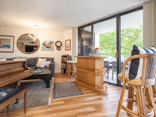 Beautiful spacious low floor corner unit (1,474 Sq ft) featuring 2 bedrooms and 2 full bathrooms. This condo has an amazing floor plan which would allow for so many possibilities. The Unit sits level with lush mature trees which create a nice private setting while you are outside enjoying the balcony. Live in a World-class, resort-style community nestled on 34 Acres which offers first class amenities, lush Lanscaping, 3 restaurants, walking trails, 8 tennis courts, kids' playground, basketball court, dog park, marina and much more. Enjoy the full-scale spa w/ an array of classes, lap pool, sauna, steam, cold plunge, and jacuzzi to name a few of the many amenities the resort has to offer. Centrally Located... Close to airports, malls and more!
