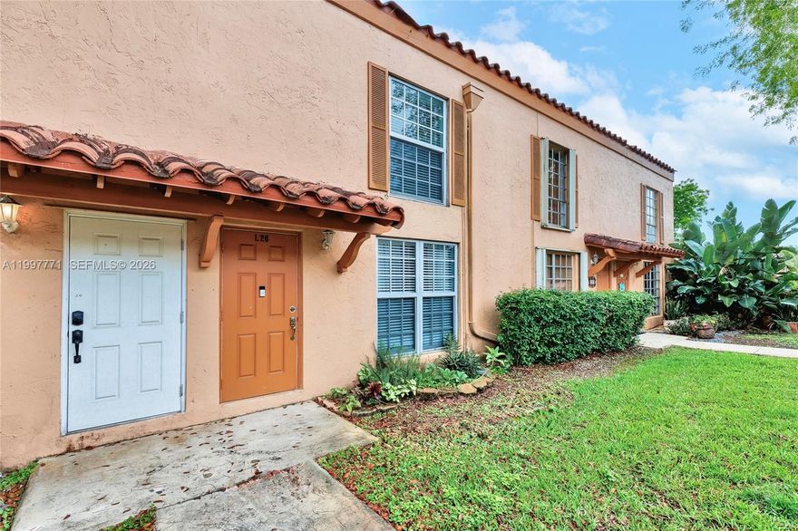 Rarely available 2 Bed / 1.5 Bath two-story townhome in the established Cypress Village community of Miami Lakes. Nearly 1,200 sq. ft. of bright, open living space featuring high volume ceilings and spacious living areas. Major upgrades include new high-impact doors and windows (2022), new A/C (2021), new electrical panel (2024), and a tankless water heater (2026). The oversized primary suite offers two walk-in closets and a modern custom bathroom with a floating vanity and dual sinks. Additional features include a new washer and dryer (2023), a private patio, and direct access to your designated parking area. Community amenities include multiple pools, tennis courts, and a dedicated clubhouse. Prime location steps from Main Street, the renovated Miami Lakes Golf Course, and the area’s top restaurants, parks, shops, and A+ rated schools!