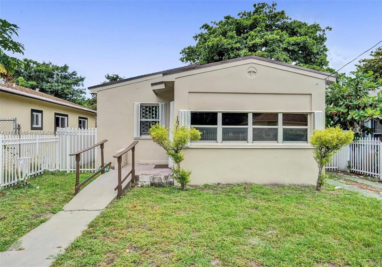 Updated gem in the heart of Liberty City, close to all the new construction and urban projects! Beautifully renovated Kitchen and baths with a fenced front and back yard. Ready for you to move in. No HOA and located near Wynwood and Brickell . Please submit all offers with Identification and proof of income.