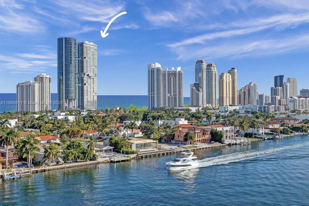 Wow! Spectacular 4 Bed + Den or Staff Room/5.5 Bath Contemporary Oceanfront Residence in Turnberry Ocean Club in Sunny Isles Beach – Newly Built in 2020. Enter Through Private Elevator Foyer & Immediately See Direct Ocean & Intracoastal Views From Every Room Through Floor To Ceiling 11 ft High Glass Windows. This Impeccably Designed Spacious Masterpiece has Custom Designed Interiors & The Finest Finishes incl. Italian Imported Chef's Custom Kitchen w/ Gaggenau Appliances, Marble Floors, Custom Lighting, Custom Closets, & an Oceanfront 11 ft Terrace w/ Summer Kitchen. Turnberry Ocean Club Offers 70,000 SF of Luxury Amenities & Unrivaled, World Class Service incl. a Three Story Private Signature Sky Club w/ Sunrise + Sunset Pools, Private Dining, Wellness Center, Entertainment, & Beach Club.