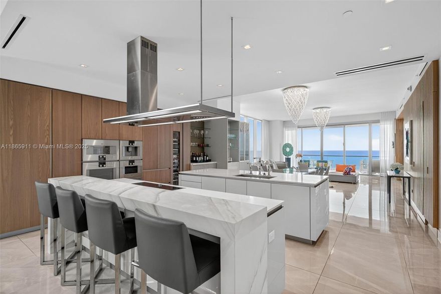 Wow! Spectacular 4 Bed + Den or Staff Room/5.5 Bath Contemporary Oceanfront Residence in Turnberry Ocean Club in Sunny Isles Beach – Newly Built in 2020. Enter Through Private Elevator Foyer & Immediately See Direct Ocean & Intracoastal Views From Every Room Through Floor To Ceiling 11 ft High Glass Windows. This Impeccably Designed Spacious Masterpiece has Custom Designed Interiors & The Finest Finishes incl. Italian Imported Chef's Custom Kitchen w/ Gaggenau Appliances, Marble Floors, Custom Lighting, Custom Closets, & an Oceanfront 11 ft Terrace w/ Summer Kitchen. Turnberry Ocean Club Offers 70,000 SF of Luxury Amenities & Unrivaled, World Class Service incl. a Three Story Private Signature Sky Club w/ Sunrise + Sunset Pools, Private Dining, Wellness Center, Entertainment, & Beach Club.