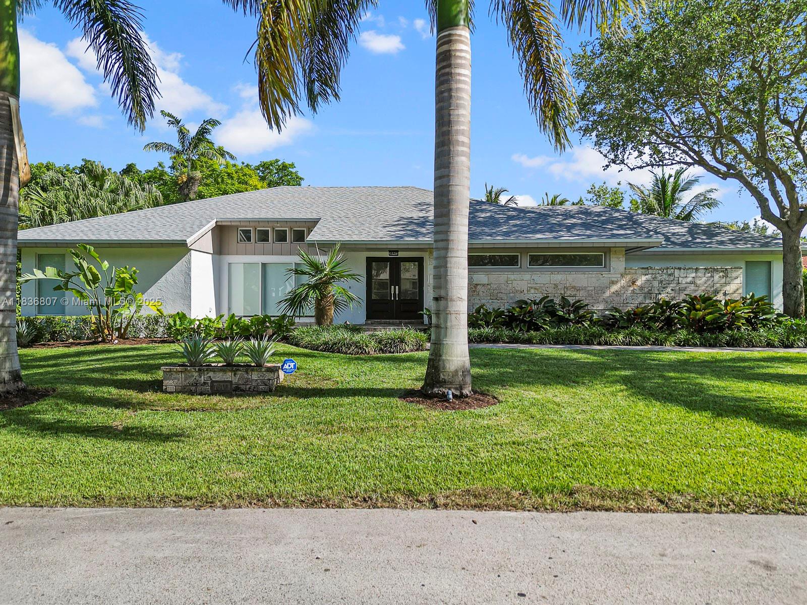 Fully renovated contemporary 5 bedroom, 3 bathroom. All new roof (June 2025), kitchen, porcelain floors, bathrooms, impact doors and windows throughout, A/C & duct work, LED lighting, pool heater and saltwater system, etc. Nanny's/in-laws quarters has private entrance. Back yard is completely fenced with concrete pad to Park boat/ RV/ Golf Cart or other toys. Located minutes from Old Cutler Road, Black Point Marina, Montessori Schools and Palmer Trinity, Westminster, Palmetto High, A-Rated schools, this home has something for everyone in your family. Minutes from the beach, malls, restaurants, highways, and all entertainment experiences. Come see it today!