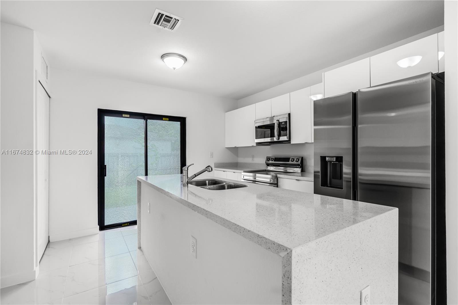 1231-1233 NW 9 AVE CONDO - Residential