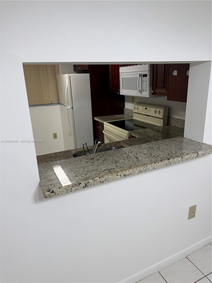 10975 SW 107th ST. 202